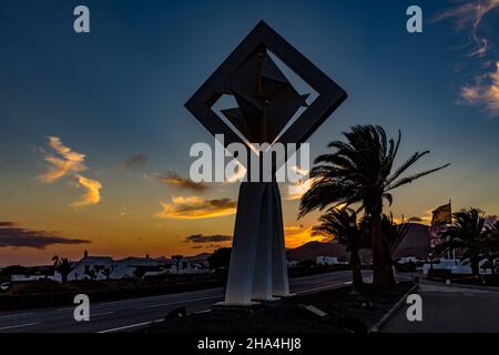 wind chimes in front of the fundacion cesar manrique at sunset,sculpture by césar manrique,spanish artist from lanzarote,1919-1992,lanzarote,canaries,canary islands,spain,europe Stock Photo