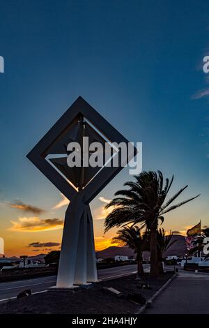 wind chimes in front of the fundacion cesar manrique at sunset,sculpture by césar manrique,spanish artist from lanzarote,1919-1992,lanzarote,canaries,canary islands,spain,europe Stock Photo
