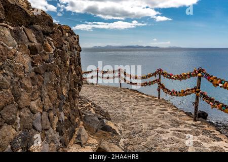 colorful love locks,viewpoint mirador en playa flamingo,behind the islands of fuerteventura and isla de los lobos,playa blanca,lanzarote,canaries,canary islands,spain,europe Stock Photo