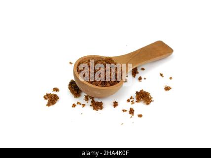 Raw Cane Sugar isolated o white background. Pile of dark brown soft sugar, isolated . Natural dark muscovado. Stock Photo