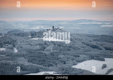 Breathtaking view from the highest mountain in the Eifel to the Nürburg in winter Stock Photo