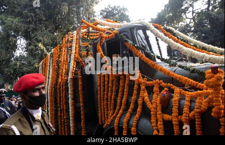 New Delhi, India. 10th Dec, 2021. Indian security personnel carries casket of Chief of Defence Staff General Bipin Rawat and his wife Madhulika Rawat in New Delhi. General Bipin Rawat, his wife Madhulika Rawat and 11 others died on 08 December when the Mi-17V-5 helicopter they were traveling on crashed near Coonoor, Tamil Nadu. (Credit Image: © Vijay Pandey/ZUMA Press Wire) Credit: ZUMA Press, Inc./Alamy Live News Stock Photo