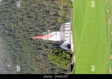 austria,tyrol,steinberg am rofan,town view,church of st. st. lambert,autumn in the brandenberg alps Stock Photo