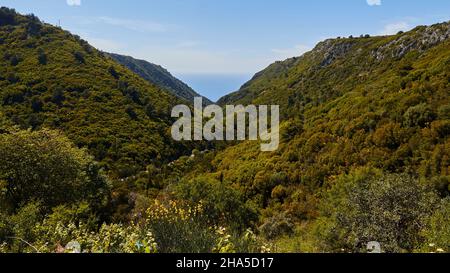 greece,greek islands,ionian islands,lefakada or lefkas,north of the islands,green mountain landscape,lush vegetation,view of the east coast,green valleys and ridges Stock Photo