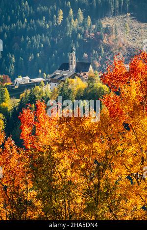 san tomaso church in autumn,san tomaso agordino,celat hamlet,dolomites,belluno province,veneto,italy Stock Photo
