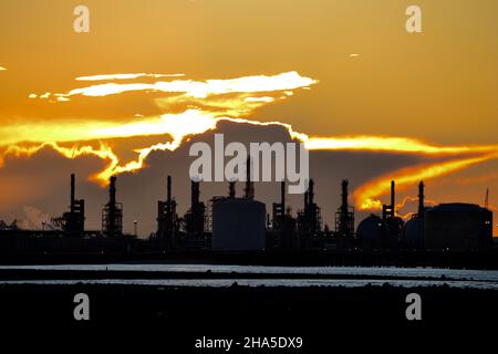 ConocoPhillips' Teesside Oil Terminal and industrial skyline at Seal Sands, Teesside, UK during a stunning sunset. Photographed from South Gare. Stock Photo