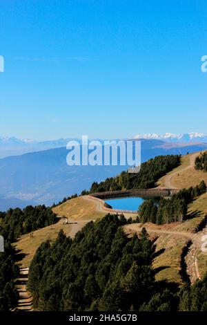 view from the rossalm on the plose over to the reservoir,newly built in 2020,reservoir,circular route,suedtirol / alto adige,brixen,south tyrol,italy Stock Photo