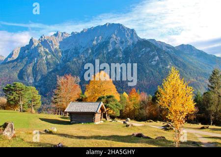 heustadl in front of karwendel mountains in mittenwald,autumn,autumn mood,germany,bavaria,upper bavaria,isar valley Stock Photo