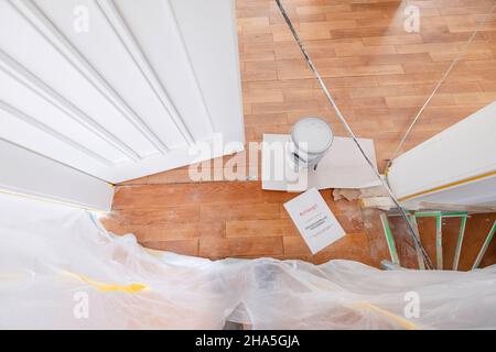 construction site,refurbishment and renovation of an apartment,brown real wood flooring Stock Photo