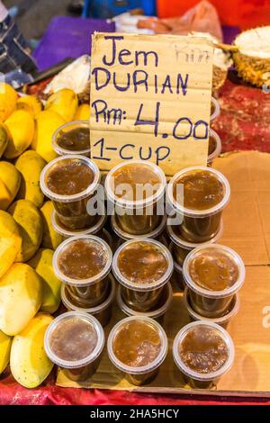 Durian jam at the night market in Kota Kinabalu, Sabah, Malaysia Stock Photo