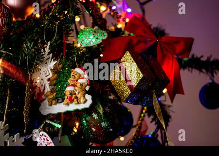 Closeup shot of ornaments and decorations on Christmas tree Stock Photo