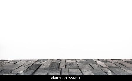 Stone table on white background. White background with stone support for presentation of advertising objects for product promotion. Stock Photo