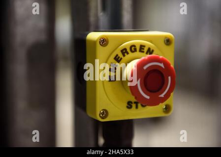 Red emergency stop button close-up Stock Photo