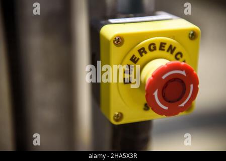 Red emergency stop button close-up Stock Photo