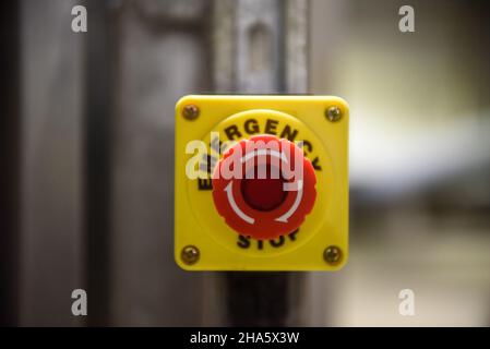 Red emergency stop button close-up Stock Photo
