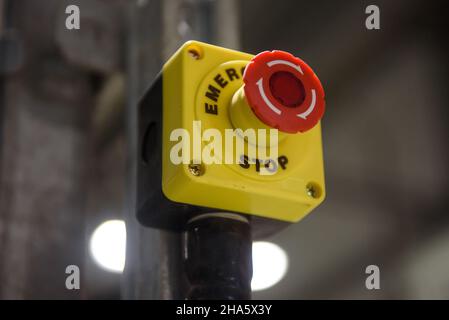 Red emergency stop button close-up Stock Photo