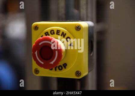 Red emergency stop button close-up Stock Photo