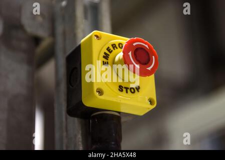 Red emergency stop button close-up Stock Photo
