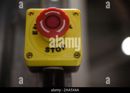 Red emergency stop button close-up Stock Photo