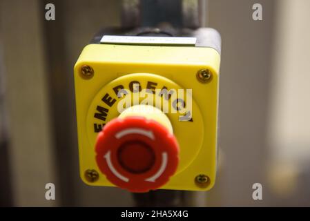 Red emergency stop button close-up Stock Photo