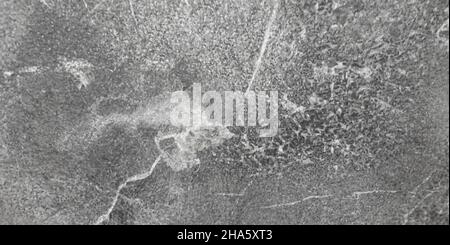 Panorama of the background of an old wall to create a background. Panoramic aspect of a facade plaster. Stock Photo