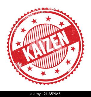 KAIZEN text written on red grungy zig zag borders round stamp. Stock Photo