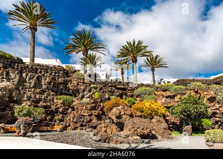 tropical garden by the swimming pool,jameos del agua,art and cultural site,built by césar manrique,spanish artist from lanzarote,1919-1992,lanzarote,canaries,canary islands,spain,europe Stock Photo