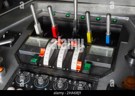 Futuristic spaceship abstract technological control panel with toggle switches and buttons or panel of unknown device or space ship Stock Photo