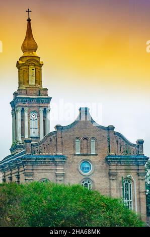 St. John the Baptist Catholic Church is pictured, Dec. 7, 2021, in New Orleans, Louisiana. The 1868 Neo-Renaissance church has a gold steeple. Stock Photo