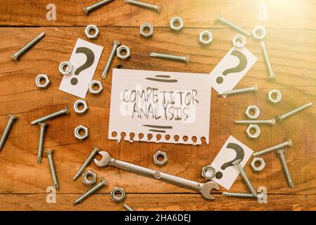 Hand writing sign Competitor Analysis. Internet Concept Determine the Strength Weakness of Competitive Market New Ideas Brainstoming For Maintenance Stock Photo