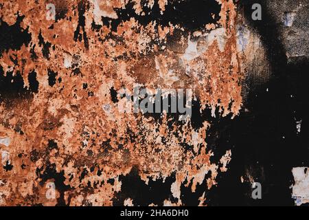 Old ruin wall with peeling paint, grunge background or texture Stock Photo