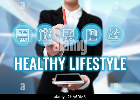 Handwriting text Healthy Lifestyle. Concept meaning Live Healthy Engage in physical activity and exercise Lady In Uniform Holding Tablet In Hand Stock Photo
