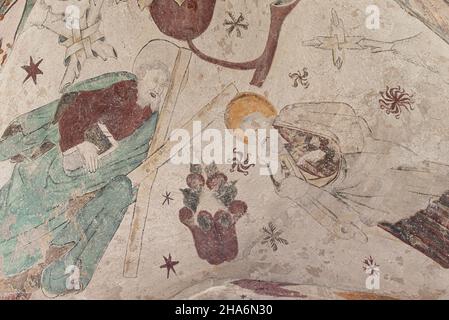 Andrew the Apostle with the x-shaped cross and John the baptist with a lamb, a fresco from 1476 in the curch of Bollerup, Sweden, September 15, 2021 Stock Photo