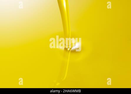 The moment olive oil is poured over the entire screen Stock Photo