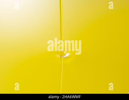 The moment olive oil is poured over the entire screen Stock Photo