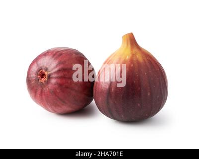 Two figs placed on a white background. Stock Photo