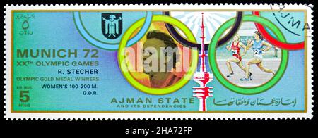 MOSCOW, RUSSIA - NOVEMBER 4, 2021: Postage stamp printed in Ajman shows Renate Stecher (1950), GDR, Summer Olympic Games 1972 - Munich (Medals) serie, Stock Photo