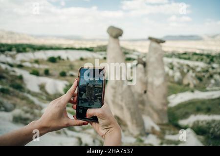 Uc Guzeller (Three Beauties) fairy chimneys in Cappadocia, Turkey. High quality photo Stock Photo