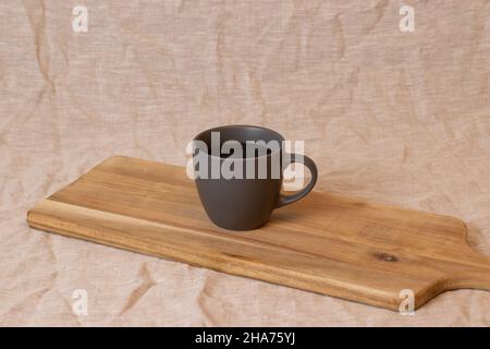 Filter coffee, wooden spoon standing on wood, on gray cover, isolated background Stock Photo