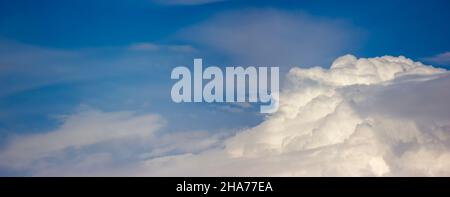 Panorama of white clouds on a blue sky Stock Photo