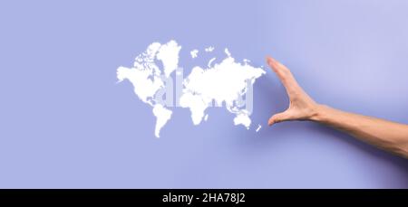 Holding a glowing earth globe social network in the hands of businessmen.World map icon,symbol. Stock Photo