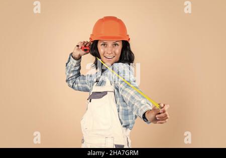 smiling female architect in safety hard hat, industry Stock Photo