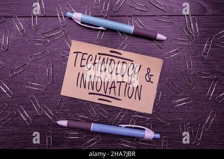 Text sign showing Technology And Innovation. Word Written on Application of better Solution for New Market Need Bright New Ideas Fresh Office Design Stock Photo