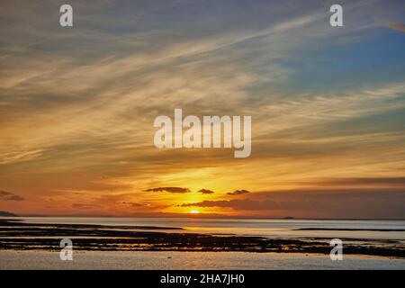 Winter sunset over the Severn Estuary at Severn Beach in Gloucestershire UK Stock Photo