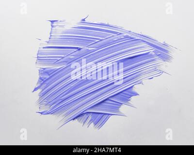 Aesthetic cosmetic texture in violet color of 2022 year very peri. Liquid cosmetic for makeup lips or eyes. Abstract background brush strokes of purple cream. Demonstrating color of 2022 year Stock Photo
