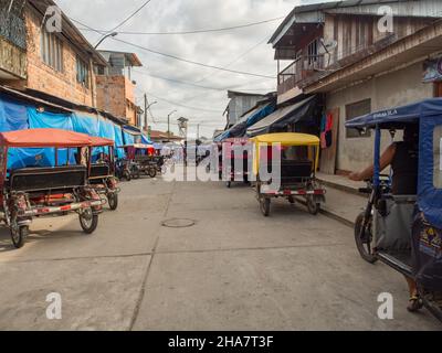 Caballococha, Peru - Dec, 2017:: Colorful rickshaws wait for passengers ...