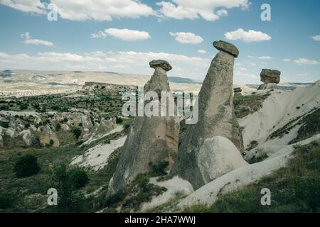 Uc Guzeller (Three Beauties) fairy chimneys in Cappadocia, Turkey. High quality photo Stock Photo