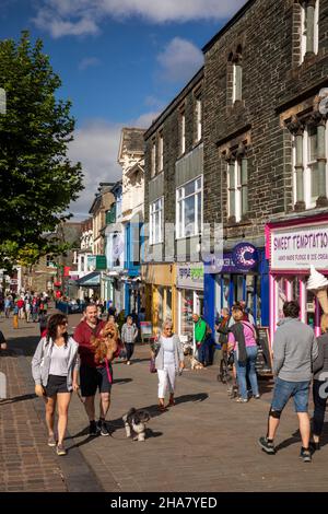 UK, Cumbria, Allerdale, Keswick, Main Street, shoppers in pedestrianised shopping street Stock Photo