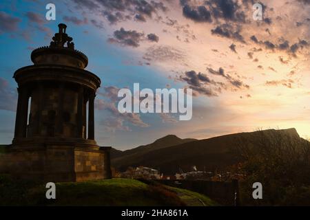 Sunrise over the Burns monument in Edinburgh in Scotland Stock Photo