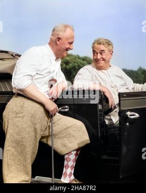 1920s 1930s ELDERLY MAN LEANING ON RUNNING BOARD OF CAR HOLDING GOLF CLUB & TALKING TO ANOTHER MAN SITTING IN THE CAR - g4106c HAR001 HARS NOSTALGIA LEANING OLD FASHION AUTO FACIAL STYLE COMMUNICATION LAUGH MOTOR VEHICLE FRIEND WEALTHY PANTS KNICKERS PLEASED JOY LIFESTYLE ELDER GOSSIP GROWNUP HEALTHINESS LUXURY TRANSPORT COPY SPACE FRIENDSHIP HALF-LENGTH GROWN-UP AUTOMOBILE MALES SPEAK GOLFING SENIOR MAN TRANSPORTATION SENIOR ADULT EXPRESSIONS HAPPINESS OLD AGE OLDSTERS CHEERFUL OLDSTER GOLFERS LEISURE AUTOS TWO MEN LOW ANGLE RECREATION ARGYLE SMILES ELDERS BAGGY AUTOMOBILES FRIENDLY JOYFUL Stock Photo